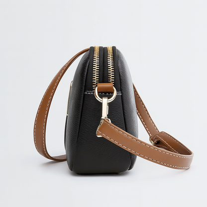 Catriona | Minimalistische schoudertas in schelpvorm